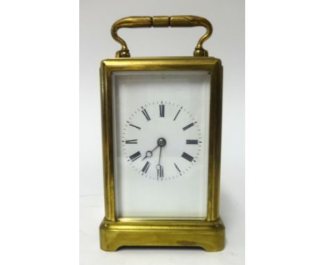 A French carriage clock with bell strike, striking on the hour and half hours, the enamel dial with Roman numerals, with key,