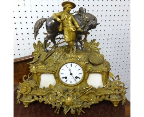 A19th century French gilt metal cased mantle clock, by Henry Marc, Paris, with key, height 37cm.