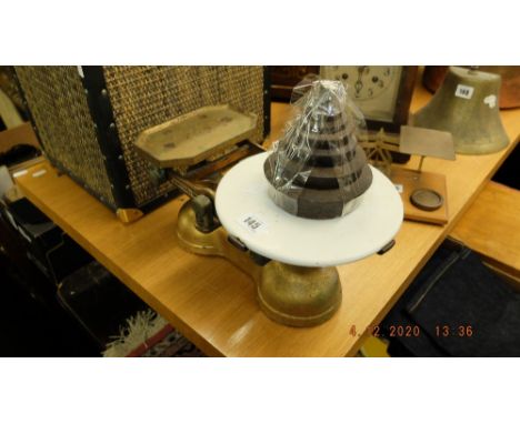A set of scales and weights by C.W Breckwell Ltd.