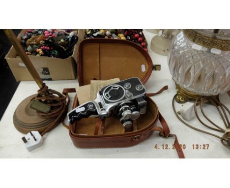 A Bolex cine camera with case, Bolex, Paillard, No: 900256, with original paperwork, case has some damage