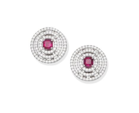 GRAFF: RUBY AND DIAMOND 'BULLSEYE' EARRINGSEach with a central step-cut ruby, weighing 2.20 carats total, within surrounds of