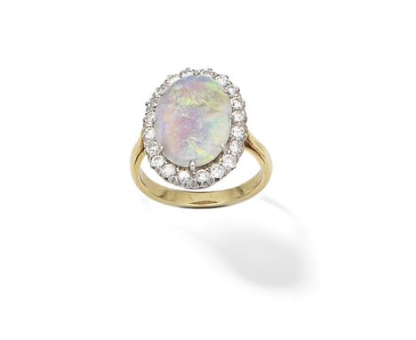 OPAL AND DIAMOND CLUSTER RINGThe oval opal cabochon within a surround of brilliant-cut diamonds, ring size approx. KFor furth