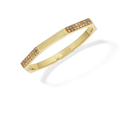 TIFFANY: DIAMOND-SET BANGLE, 1978Of hexagonal outline, the 18 carat gold bangle set with brilliant-cut diamond accents, diamo