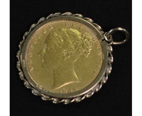 A Victorian young head gold sovereign, 1868, shield back, gold mount