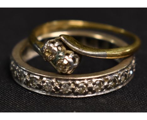 Rings - An Edwardian diamond cross over two stone ring, 18ct gold shank; another 18ct gold diamond full eternity ring, 5g gro