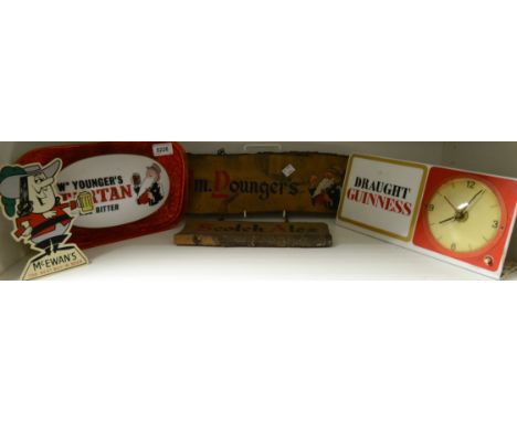 Advertising/Breweriana - a late 1960's Younger's Tartan Keg Bitter bar light; a Draught Guinness bar light and clock; a Young