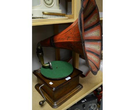 A 1920/30s oak cased table top gramophone, indistinct maker's mark painted tin horn, HMV exhibition sound box 