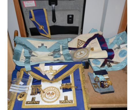 Masonic Interest - Masonic regalia including aprons, sash, two hallmarked silver Masonic jewels, etc, cased