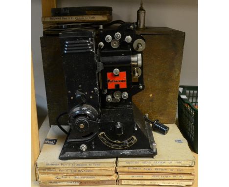 An early 20th century Pathescope projector, fitted case; a collection of news reels, including El Alamein to Tunis, Liberatio