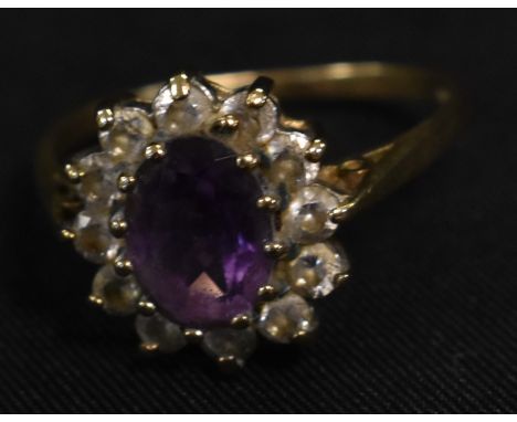 A 9ct gold amethyst and cz cluster ring, Birmingham 375 marks, 2.1g gross