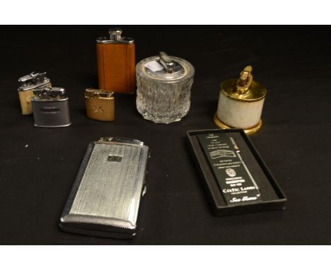 Boxes and Objects - a Ronson lighter; another, similar; a cigarette case lighter; other lighters; a pigskin hip flask (8)