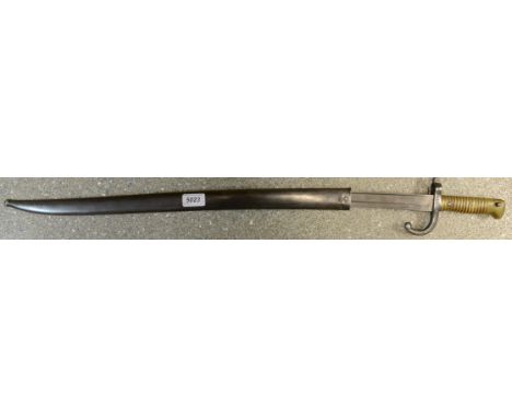 A 19th century French chasse pot bayonet and scabbard, dated 1872