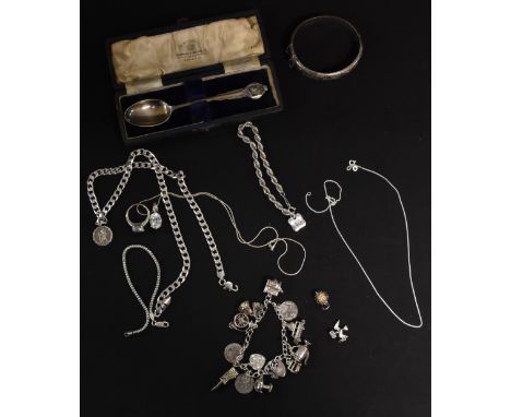 A silver charm bracelet; others, bangle, charms, rings, spoon; etc 