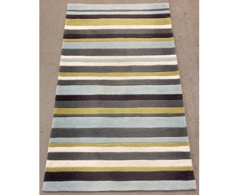 A modern 'Think Rugs' acrylic striped rug in grey, pale blue, cream &amp; lime green colours. 90cm x 150cm. Small repair to u