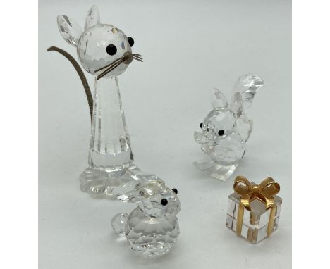 3 unboxed Swarovski crystal animal figures. A tall cat with metal whiskers and chain tail, a squirrel and a rabbit. Ears have