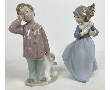 2 retired Nao Spanish ceramic figurines. Sleepy Head from 1990 and a windswept girl holding a bunch of flowers, 1989. Both ap