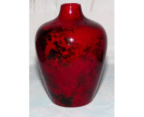 A flambé ware vase with red and black mottled glaze, signed 'E R Wilkes', height 4"