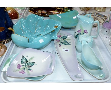 Seven pieces of Carltonware decorated with convolvulus; a similar turquoise leaf dish (a.f.); 3 similar pieces