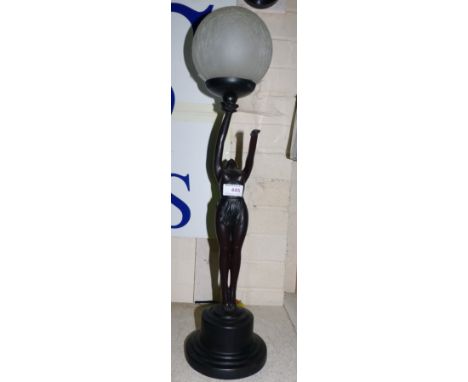 An Art Deco style table lamp with bronzed female dancer and globe shade