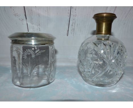 A white metal scent bottle with blue enamel top; a silver top trinket jar; a small Bristol blue jug with trailed decoration; 