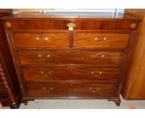 A Georgian mahogany chest of 3 long and 2 short drawers with Sheraton style inlay, brass swan neck handles and ogee bracket f