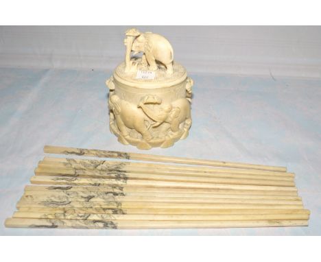 A pre 1920's Indian tea caddy, 5"; a set of 12 early 20th century oriental chopsticks with engraved dragon decoration, 10"