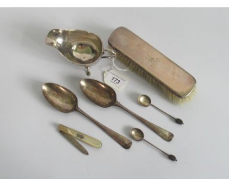 A small mixed quantity of hallmarked silver items, to include: two serving spoon, London 1771, gravy boat Birmingham 1928/9, 