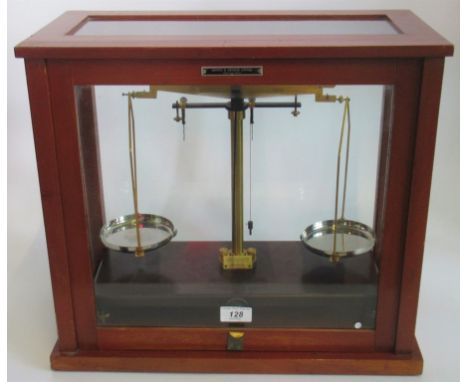 A glass and wood cased set of Griffin &amp; George weighing scales. Condition Report: Overall condition good, no visible sign