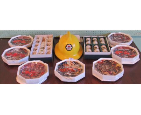 A circa 1960's yellow London Fire Service helmet, together with several decorative commemorative plates depicting the fire se