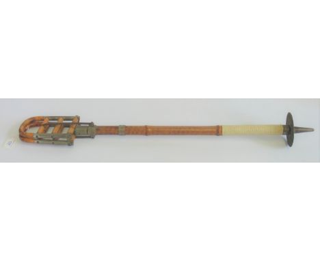 An Edwardian bamboo and metal shooting stick.