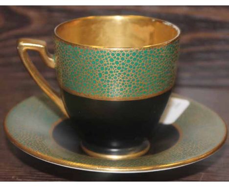 STOKE ON TRENT CARLTON WARE CUPS AND SAUCERS 
with black,green and gilt decoration