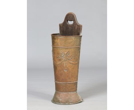 A nineteenth century oak and copper stick stand. Embossed with ribbon swags, 83cm. Condition Report. To be used as a guide on