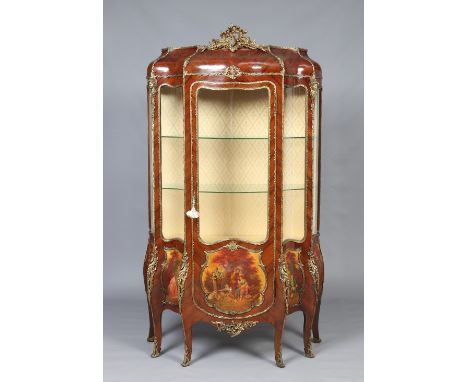 A French style kingwood five glass large vitrine display cabinet. Ornamented with gilt metal mounts and raised on a bombe sha