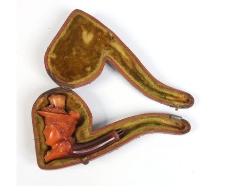 A nineteenth century cased meerschaum pipe formed as a woman wearing a hat.  Condition Report. To be used as a guide only. St