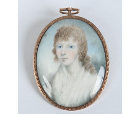 A Georgian yellow metal brooch / pendant set with an ivory portrait miniature of a young boy, 6.75cm. Condition Report. To be