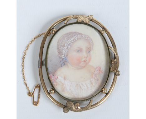A Victorian pinchbeck brooch set with an ivory portrait miniature of a baby, 6.5cm. Condition Report. To be used as a guide o