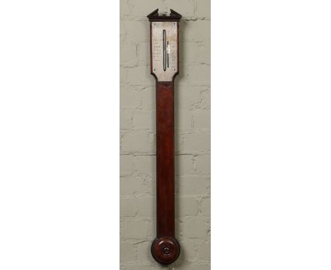 A Georgian mahogany stick barometer by Pastorelli, London. With engraved silvered scale and adjuster, 100cm. Condition Report