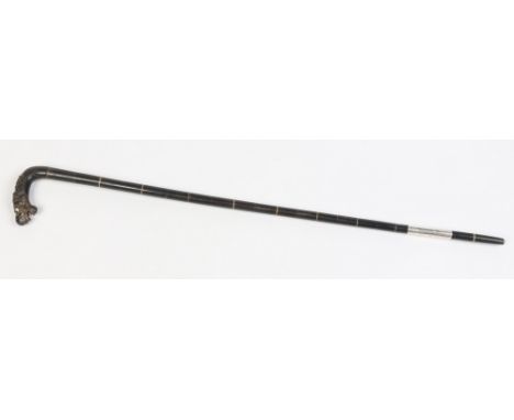 A Chinese sectional horn walking stick with carved grip formed as a dragons head, 82cm. Condition Report. To be used as a gui