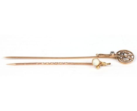 A 15 carat gold stick pin set with an opal and a 10 carat gold stick pin set with a diamond and pearls, 2.09 grams total. Con