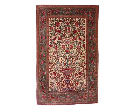 A very fine mid nineteenth century hand woven silk carpet, probably Persian. With gold ground field depicting a twin handled 