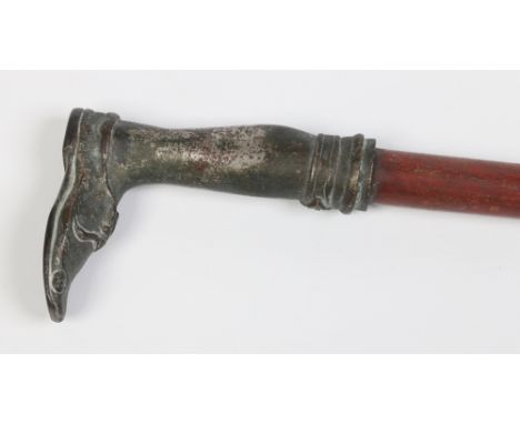 A novelty walking stick with a metal handle formed as a leg, 86cm. Condition Report. To be used as a guide only. Handle pitte