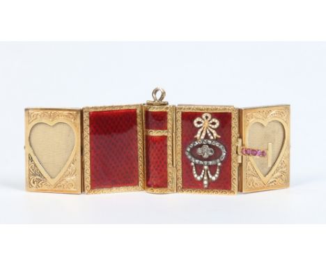 A Victorian yellow metal regard book locket. Decorated with red guilloche enamel, with opals and rough cut diamonds to the co