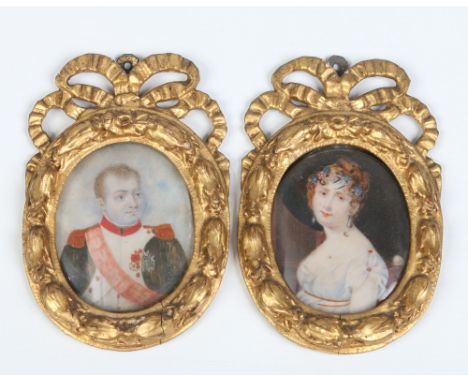 A pair of early nineteenth century portrait miniatures in giltwood and gesso frames depicting Napoleon Bonaparte and Josephin
