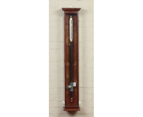 A mahogany cased Casella stick barometer with silvered scales, 126cm.
