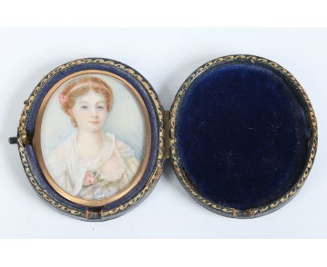 A nineteenth century cased ivory portrait miniature. With yellow metal bezel and depicting a young woman, 5cm. Condition Repo