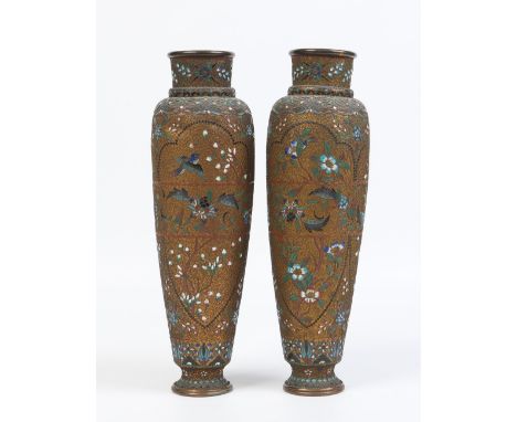 A pair of late nineteenth century Oriental champleve enamel high shouldered vases decorated with birds and flowers over filig