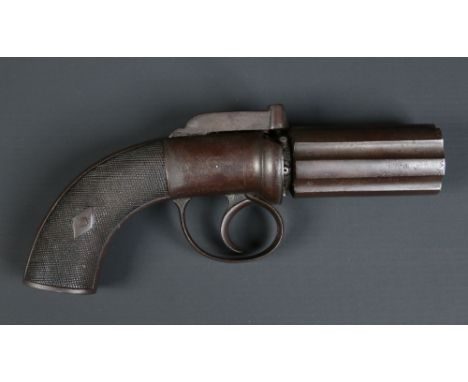A nineteenth century six shot pepperbox revolver. With London proof marks, bar hammer and knurled walnut grip scales. Barrels