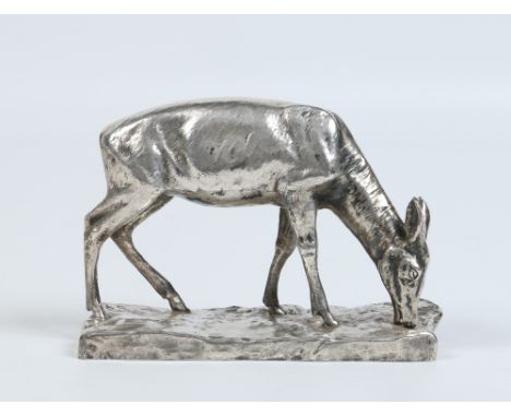 A silvered spelter model of a grazing doe. Signed R. Pohl, 09. Numbered 265 / 264 to the underside, 13.5cm.