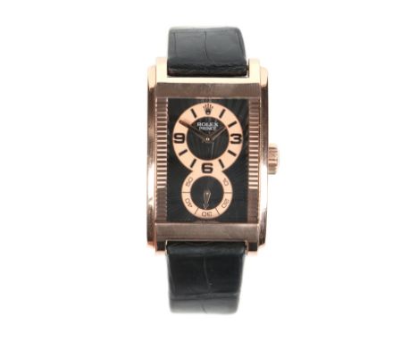 A boxed gentleman's Rolex Cellini Prince manual wristwatch in 18 carat rose gold case with leather strap and gold butterfly c