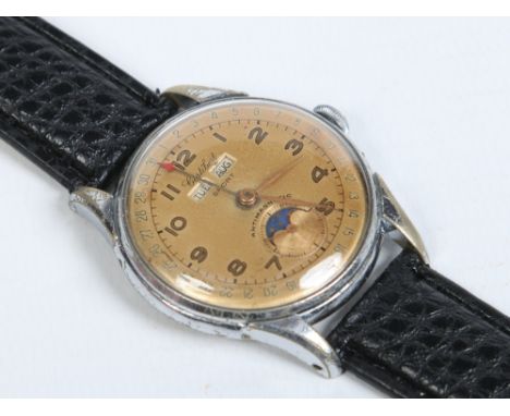 A Cortebert Sport triple calendar moonphase manual stainless steel wristwatch. With gilt dial having centre date, day and mon